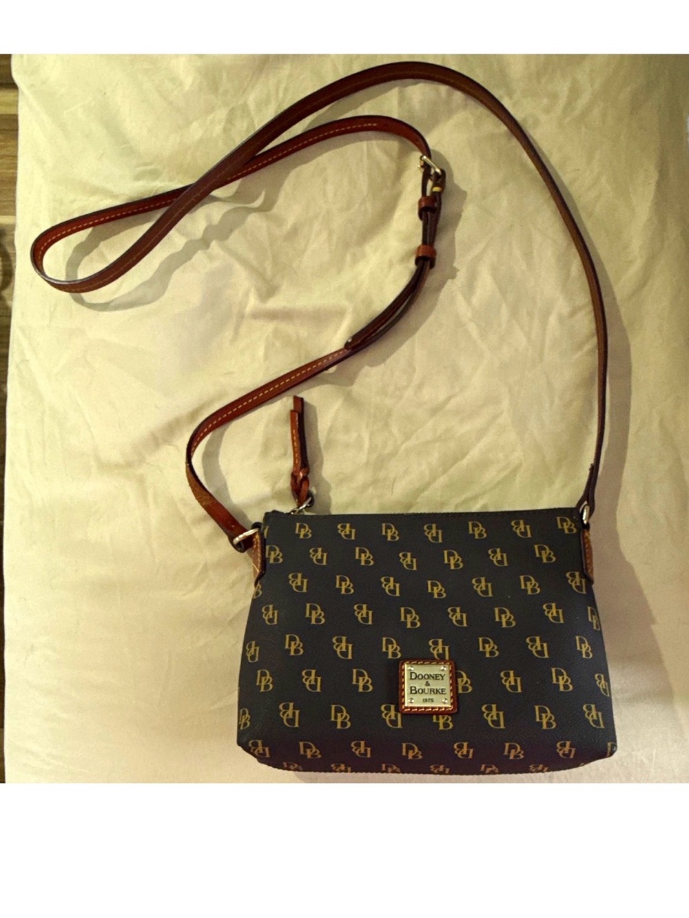 Dooney & Bourke Navy Logo Crossbody with Brown Leather Strap